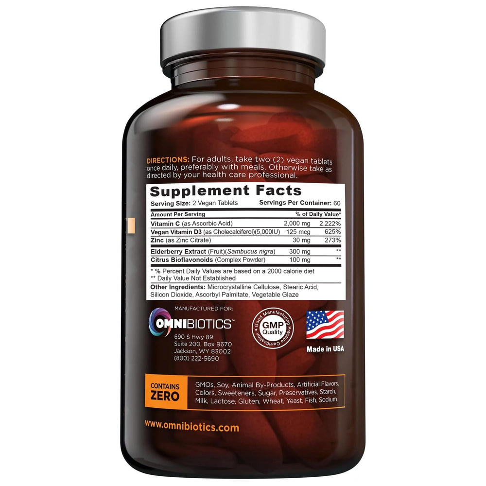 OmniBiotics bottle shown on a clean desk suggests convenient high-potency daily intake.