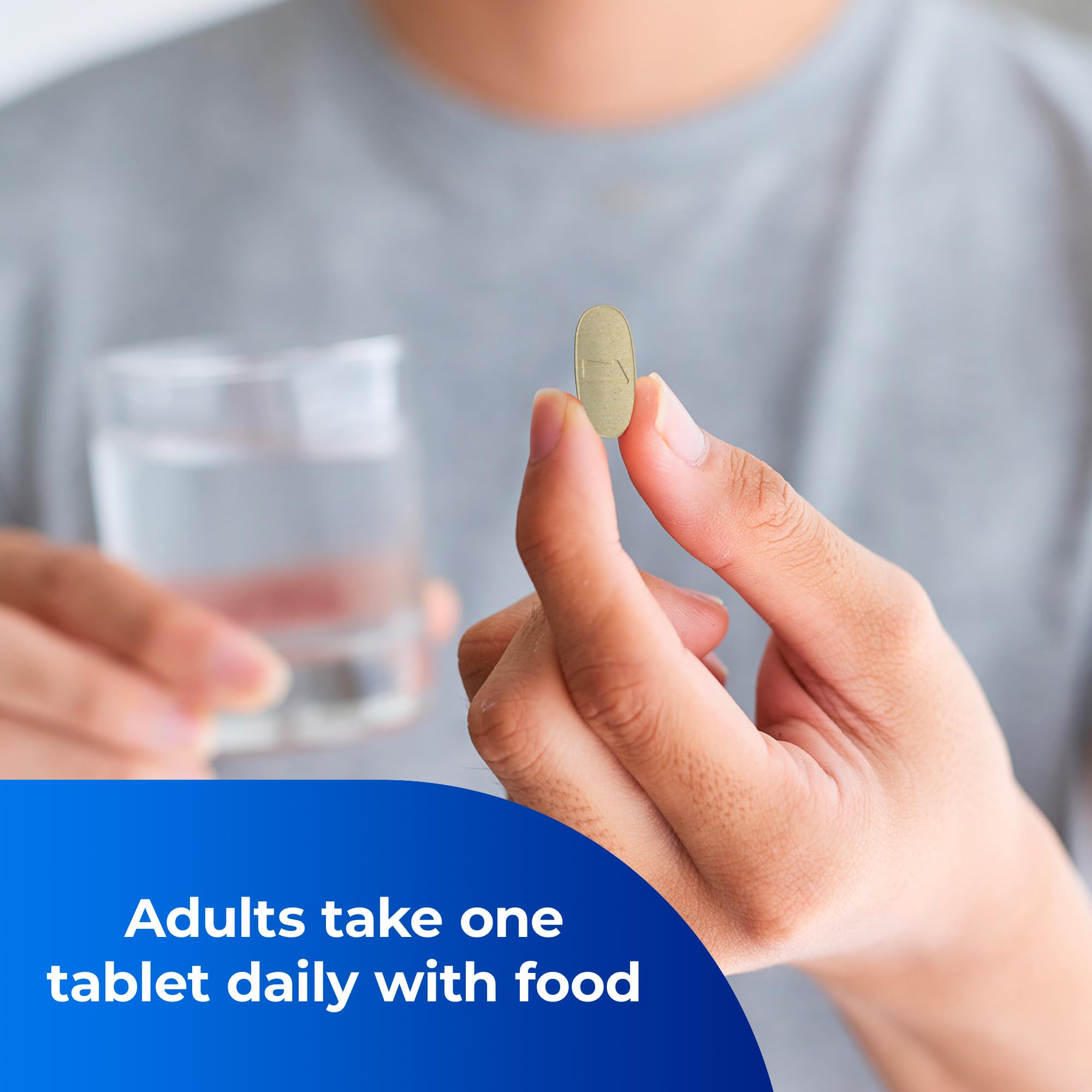 ONE A DAY Men's Pre-Conception Health bottle with glass and pills for easy dosing