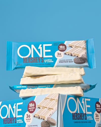 ONE Protein Bar cookies n creme half bar highlighting creamy texture