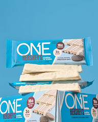 ONE Protein Bar cookies n creme half bar highlighting creamy texture