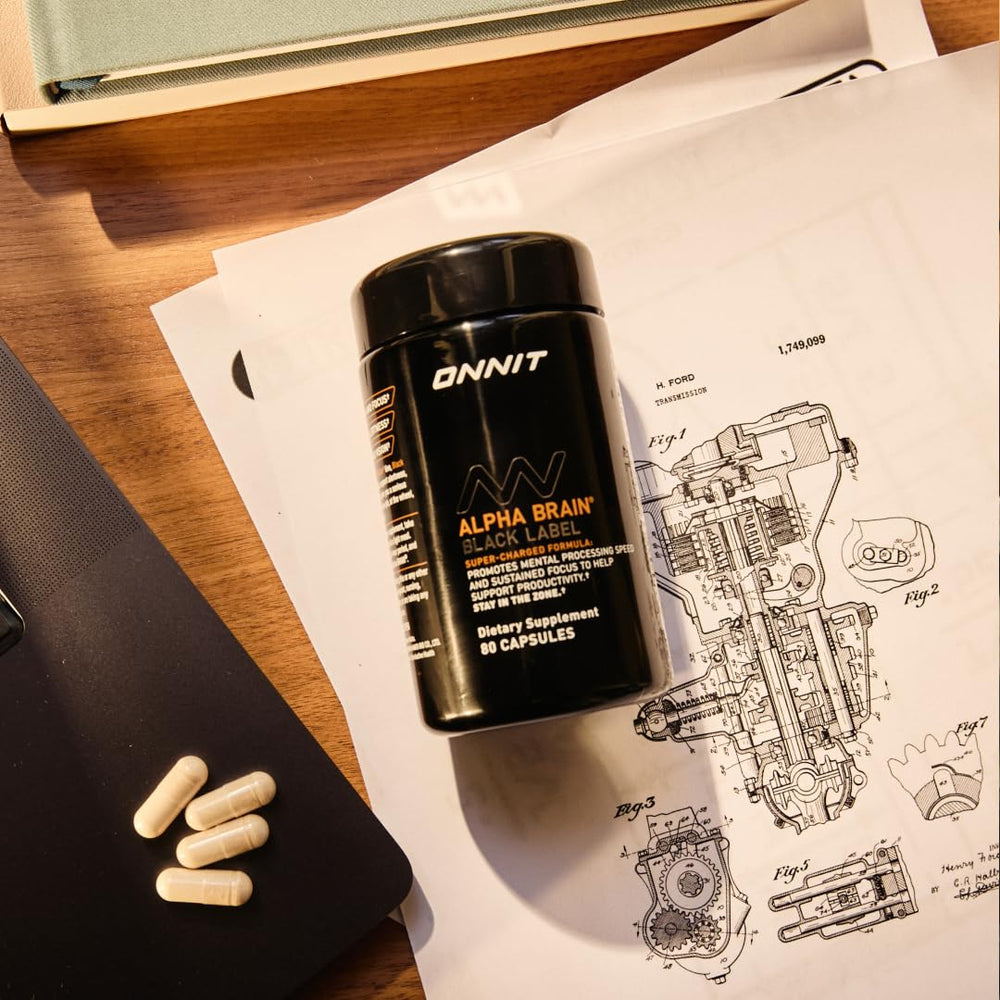 ONNIT Alpha Brain Black Label packaging on a clean surface