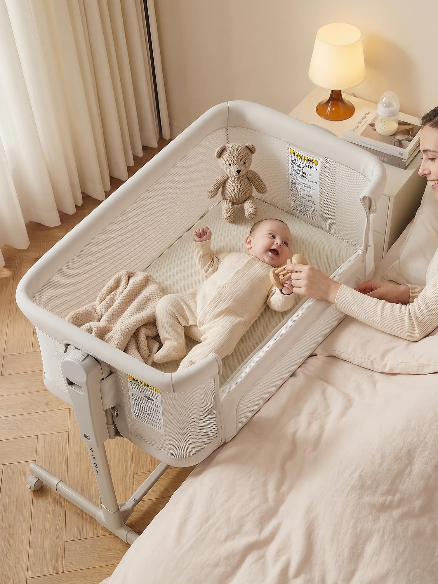 ONTHEWEI Baby Bassinet bedside sleeper in assembly with sturdy anti-wobble frame for safe night care