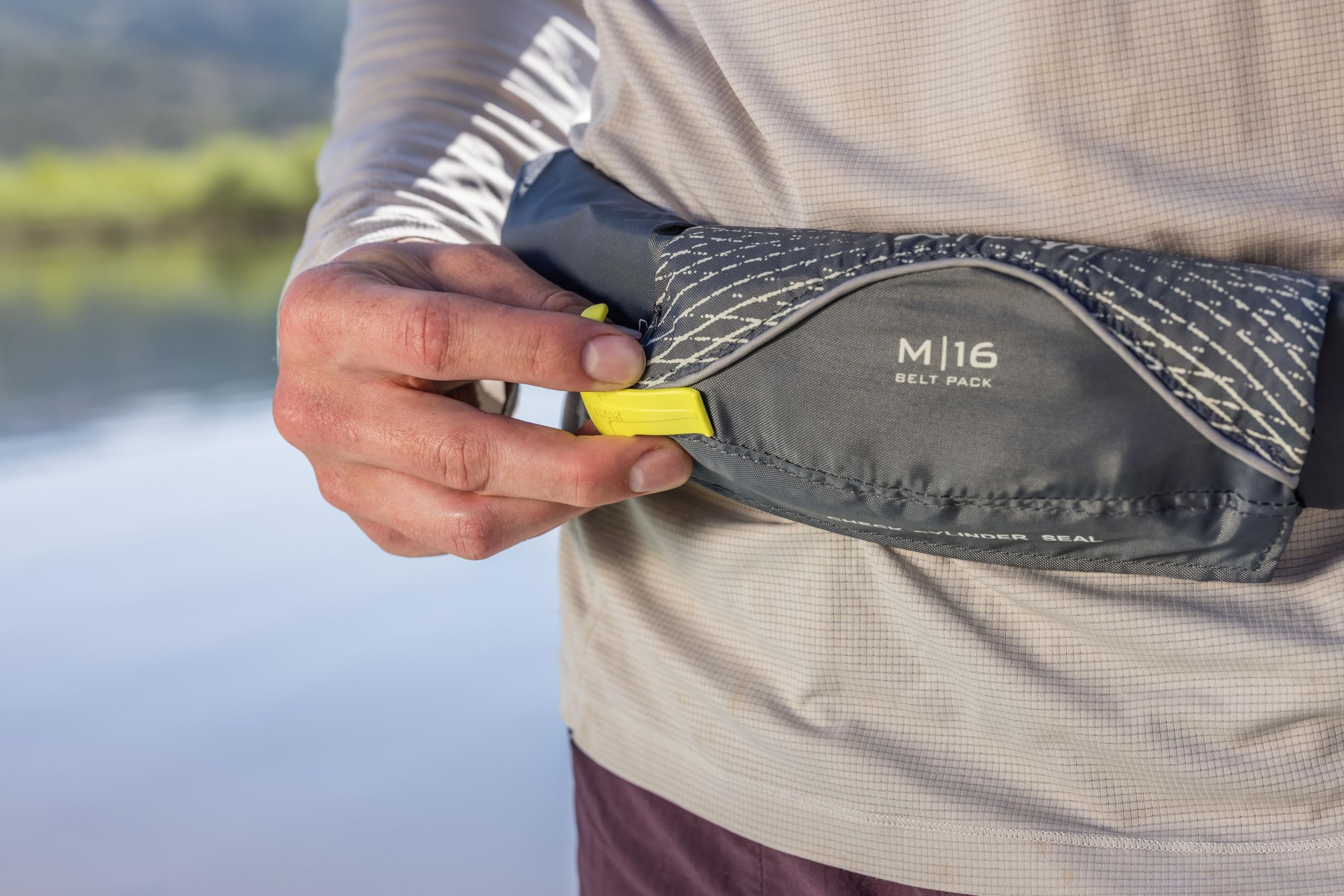 Onyx M-16 belt pack worn at the waist for unrestricted paddling movement.
