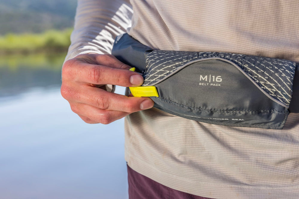 Onyx M-16 belt pack worn at the waist for unrestricted paddling movement.