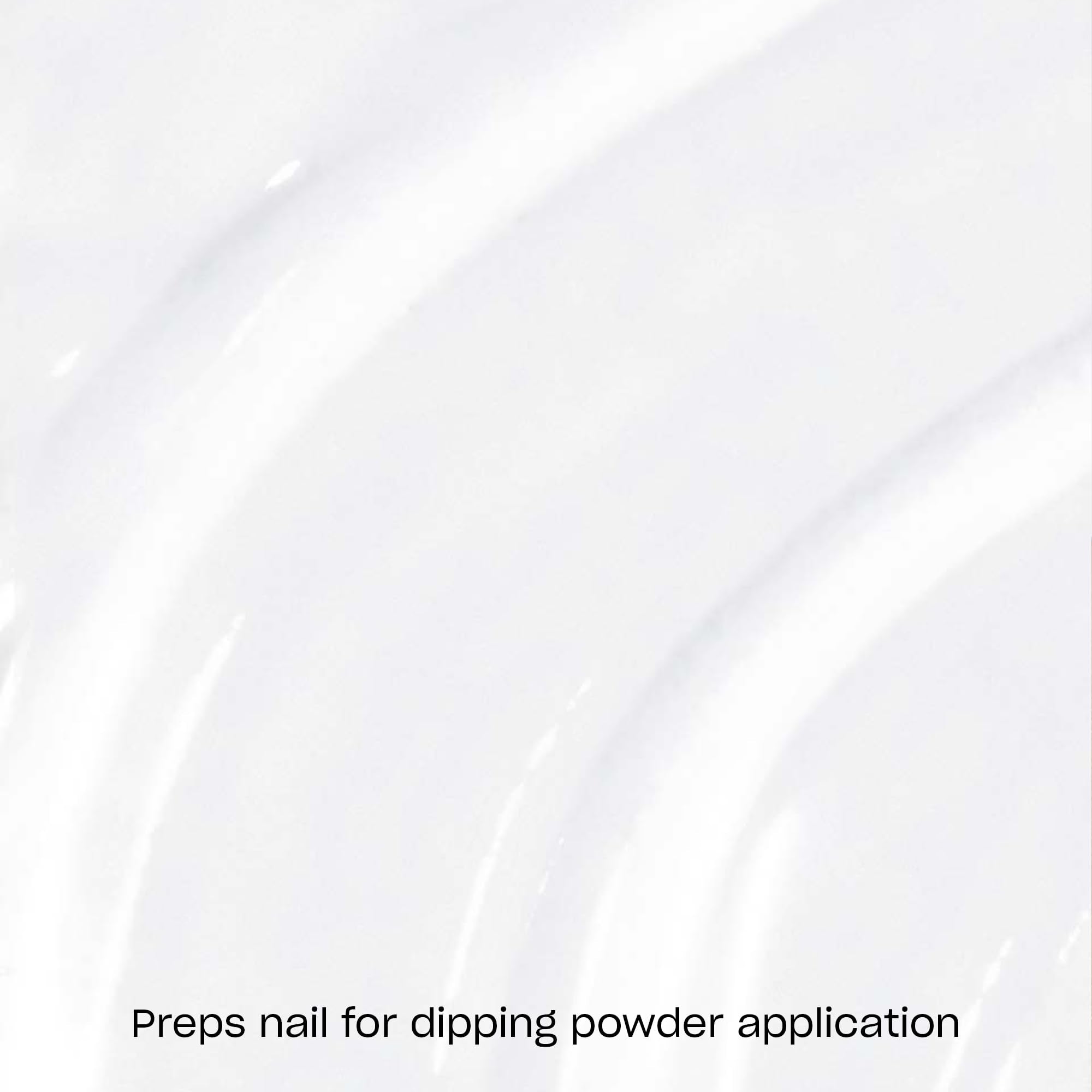 Closeup shows resin base coat enhancing nail surface adhesion