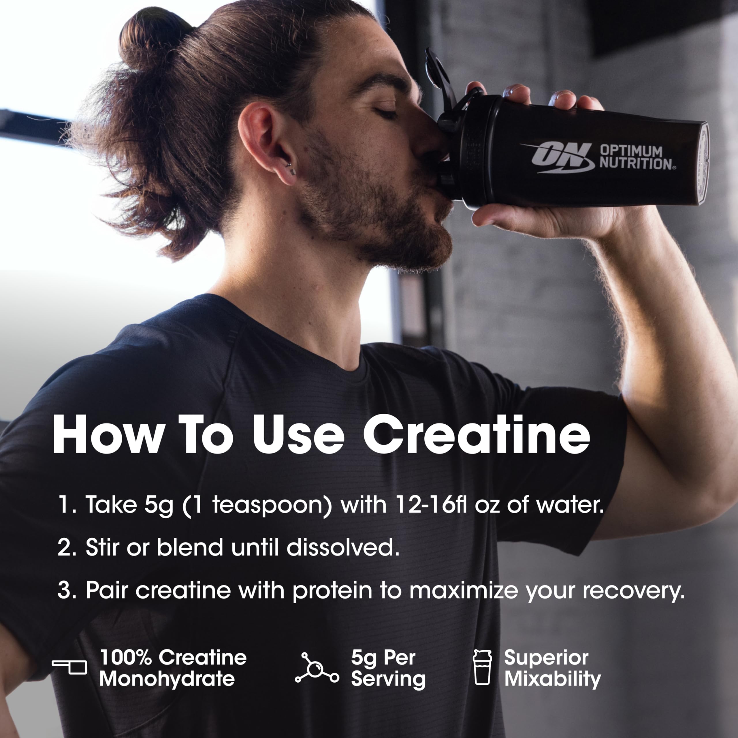 Optimum Nutrition creatine micronized blueberry lemonade athlete prep setup on kitchen counter.