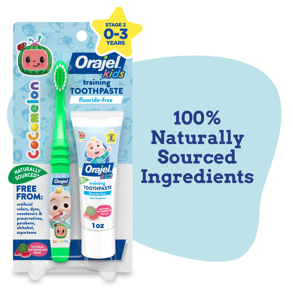A smiling child after brushing with Orajel Kids CoComelon set.