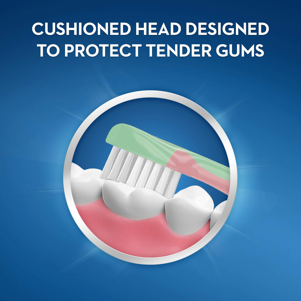 Oral-B Pooh baby toothbrush with baby-soft bristles for gentle cleaning.