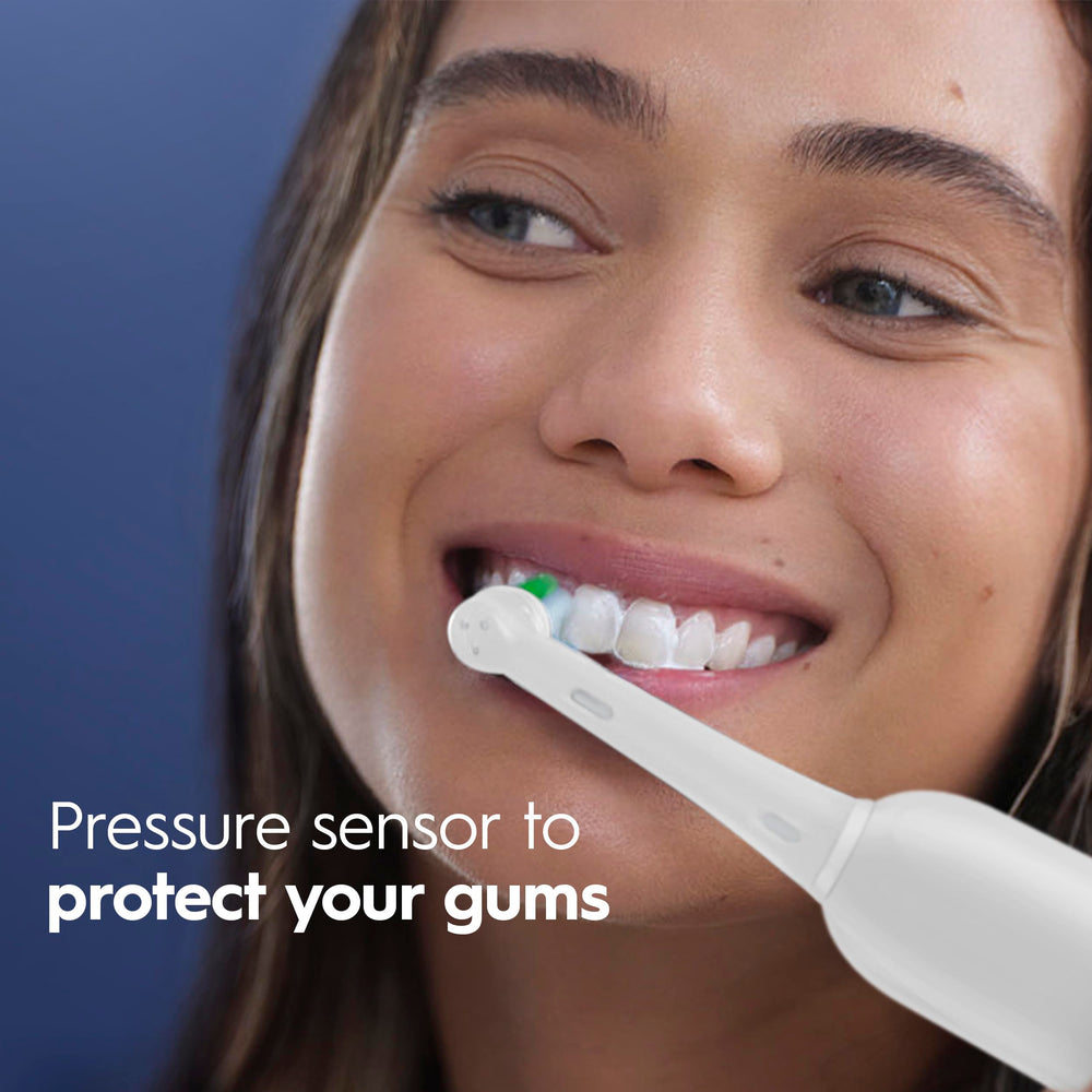 CrossAction brush head with 16-degree bristles reaches between teeth