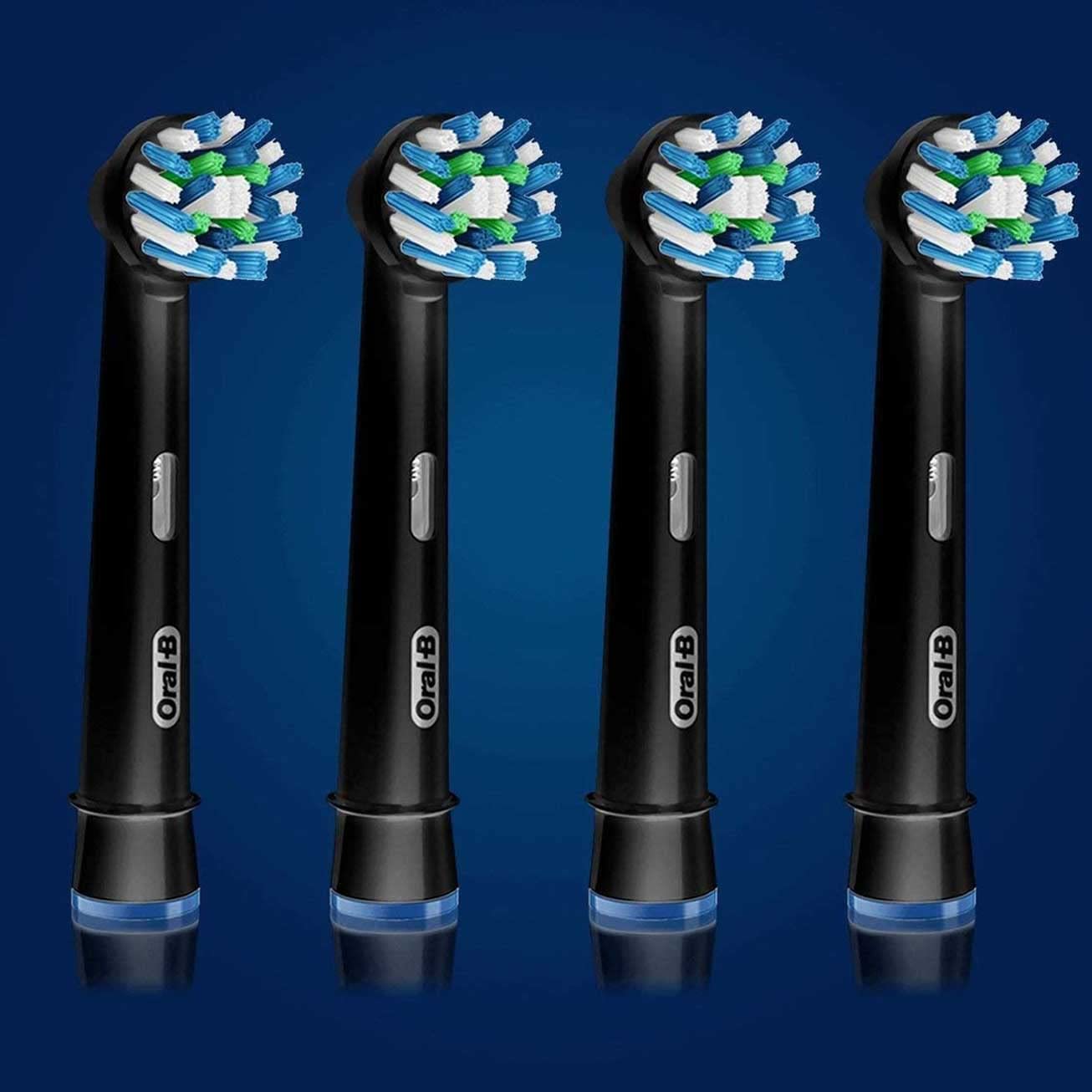 Oral-B CrossAction head black bristles close-up showing angled design for cleaning