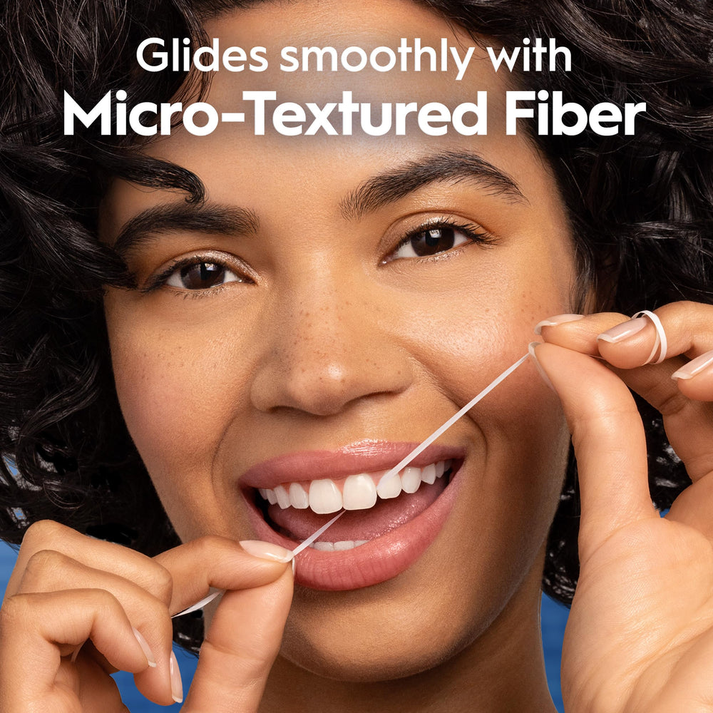 Oral-B Glide floss highlighting below-gum-line cleaning visualization