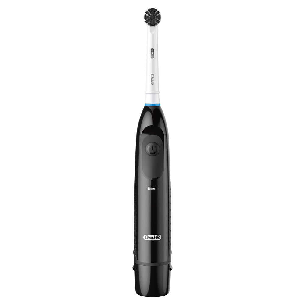 Oral-B Pro 100 Charcoal cup-shaped bristles demonstrate stain-removal potential on tea and coffee marks.