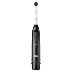 Oral-B Pro 100 Charcoal cup-shaped bristles demonstrate stain-removal potential on tea and coffee marks.