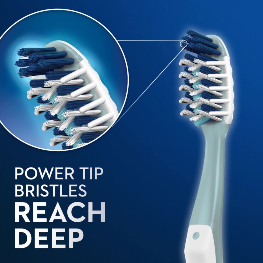CrossAction bristles angled to target plaque between teeth