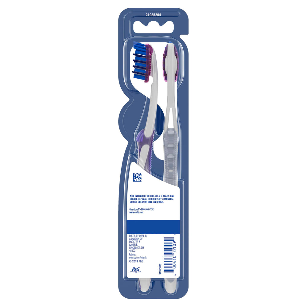Oral-B stain eraser bristles in action against surface stains near front teeth.