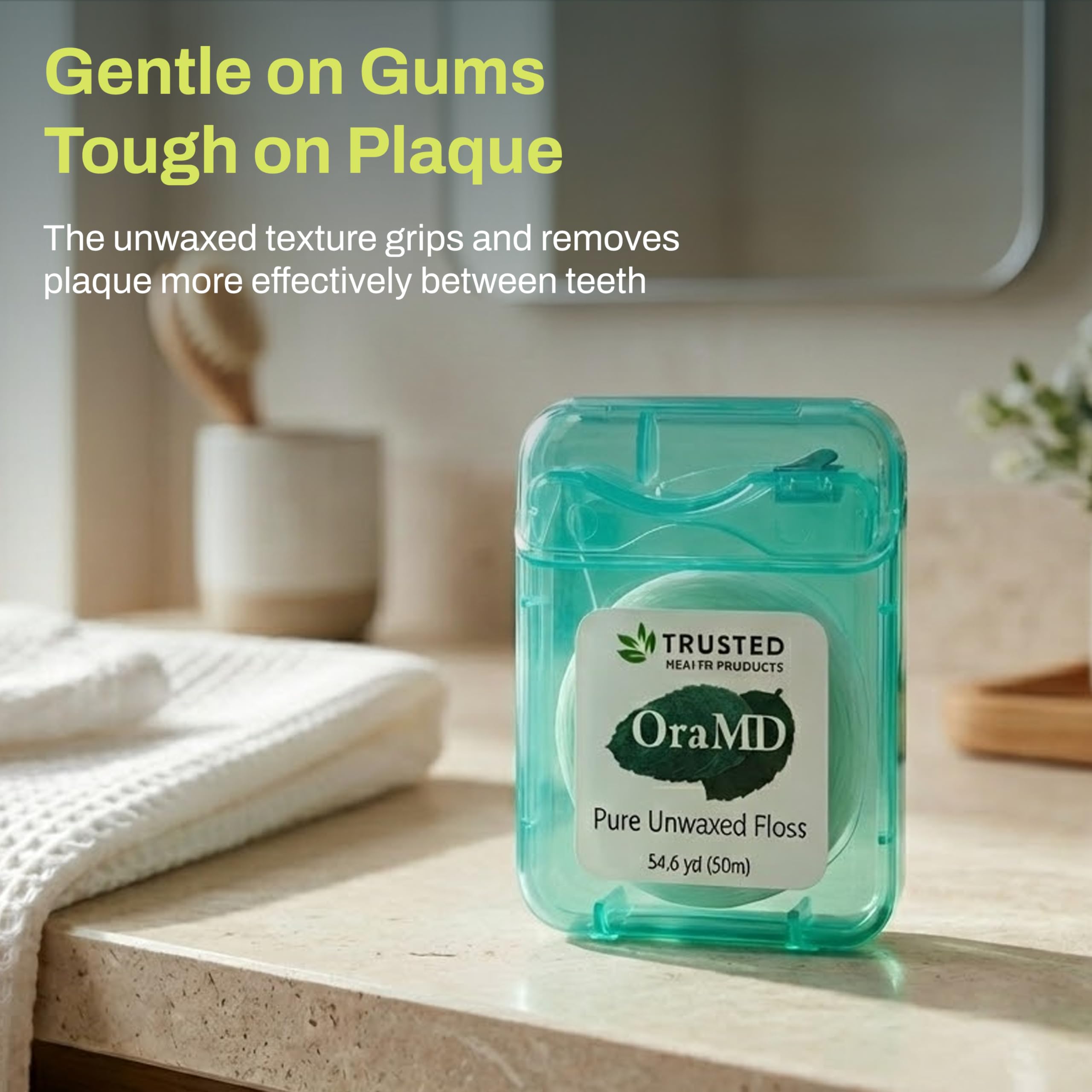 OraMD floss close-up shows smooth texture for comfortable daily flossing.