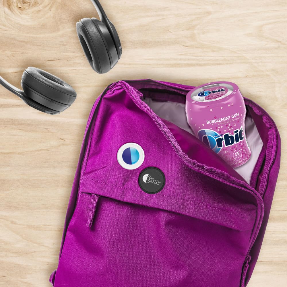 Orbit Bubblemint gum bottle held in hand for quick, portable freshness.