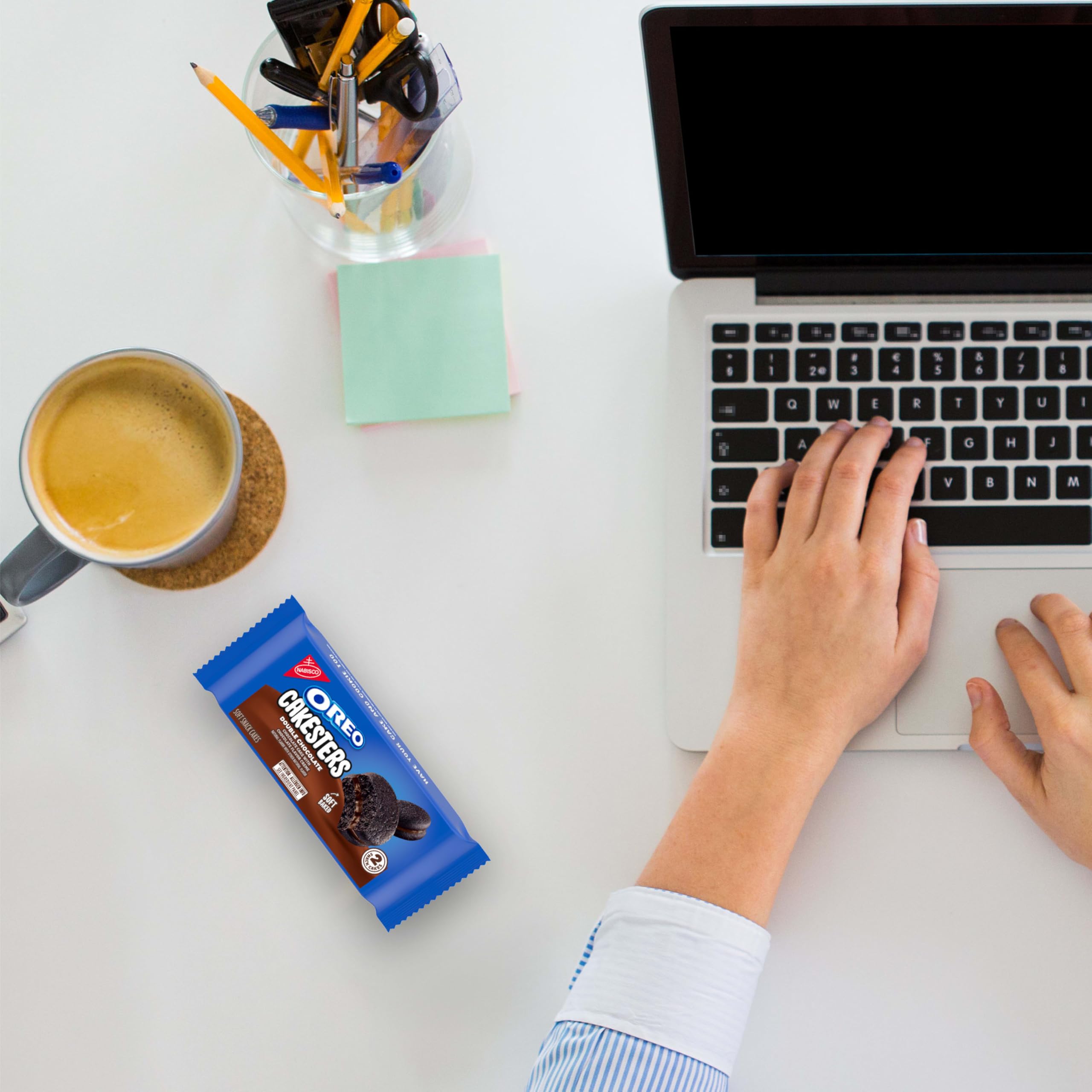 OREO Cakesters Double Chocolate closeup of two chocolate cakes with chocolate creme.