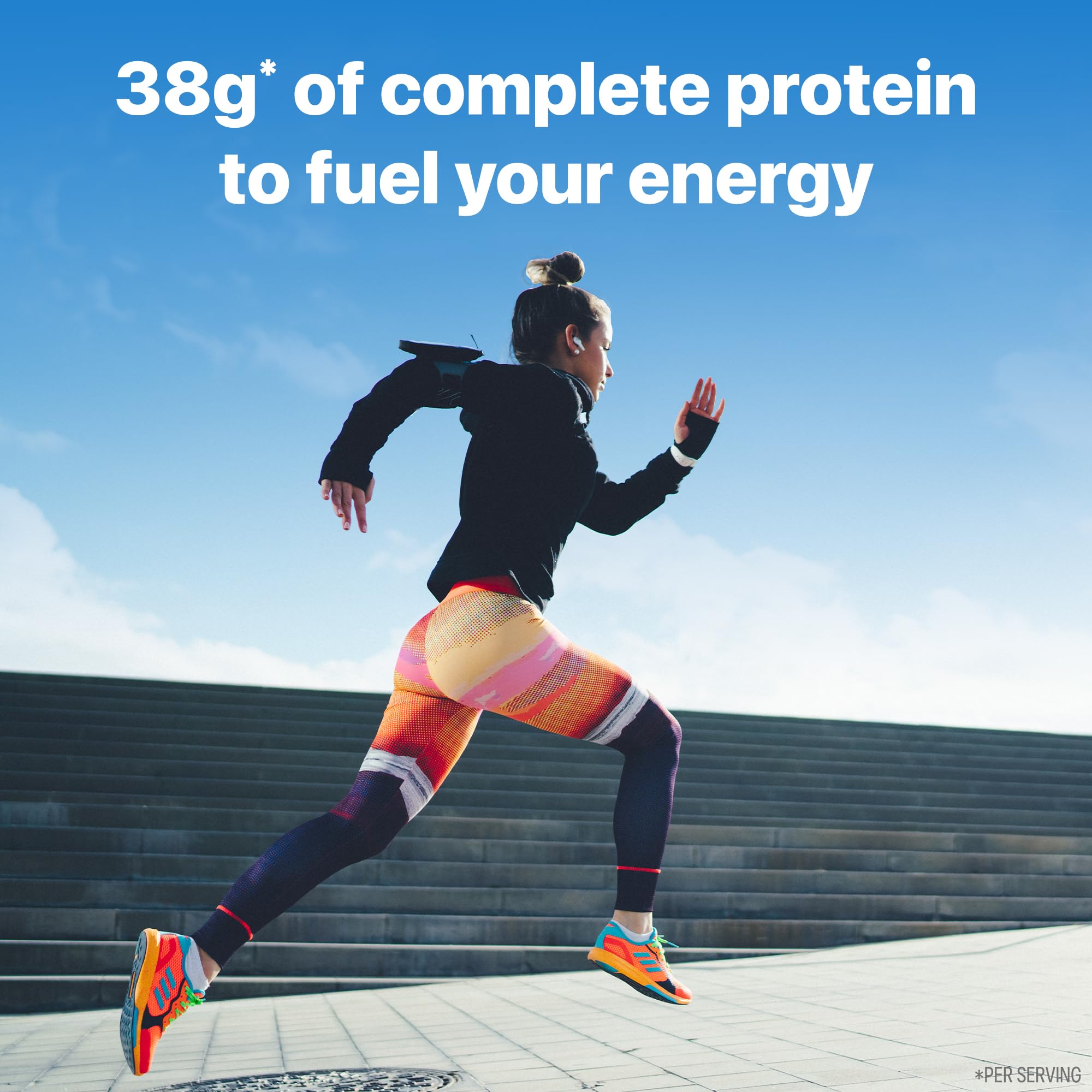 Orgain 38g protein shake glass with straw suggests creamy, satisfying taste.
