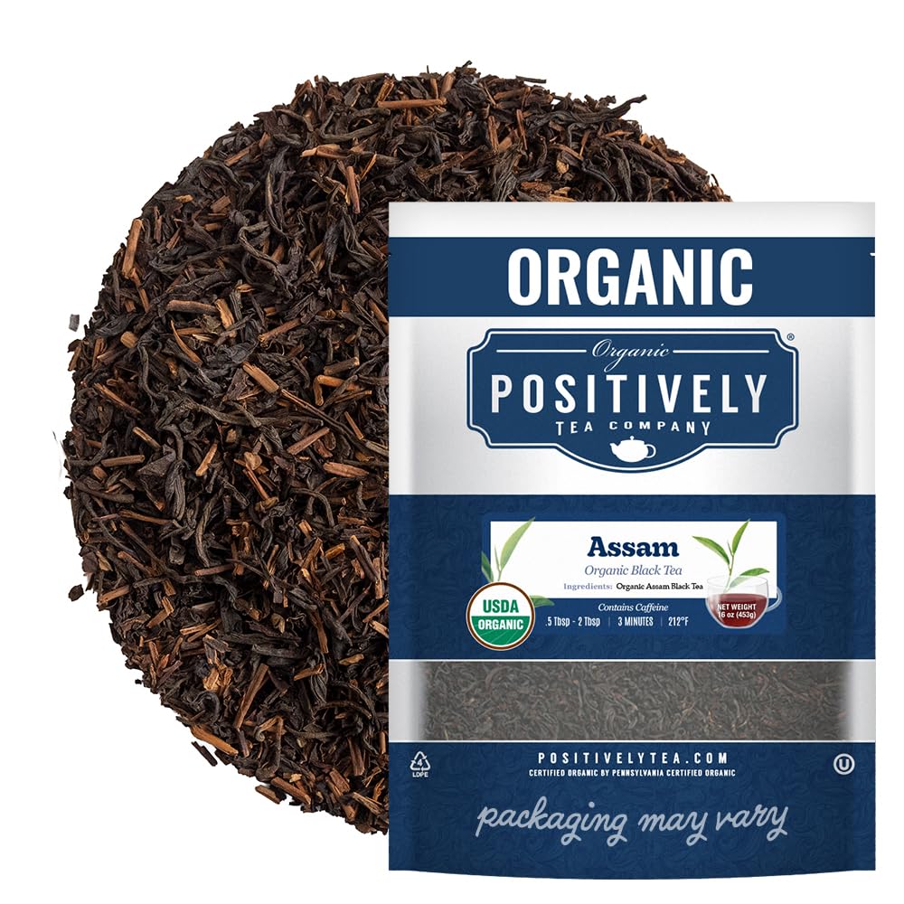 Organic Positively Tea Company Assam TGFOP loose-leaf tea in a bowl, rich aroma ideal for morning ritual.