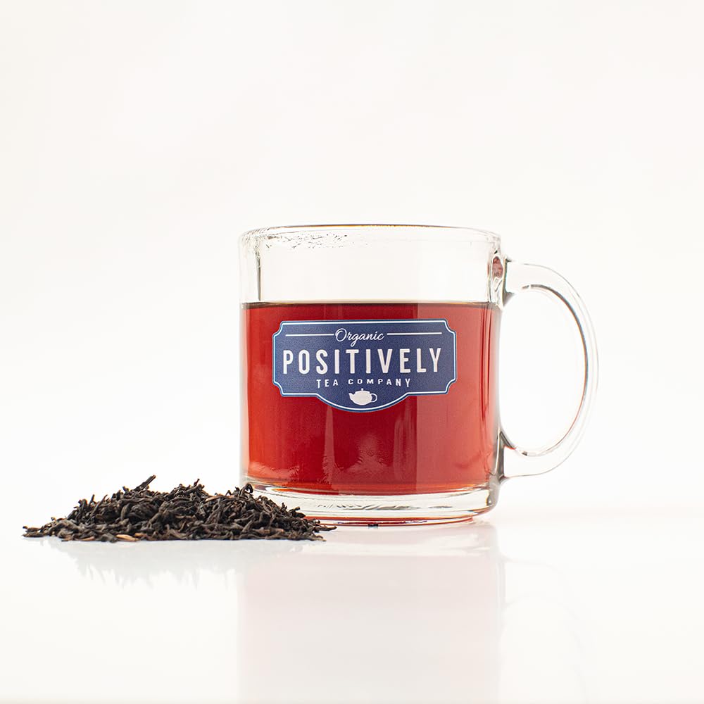 Organic Positively Tea Company Assam TGFOP tea in infuser, easy brewing for busy mornings.