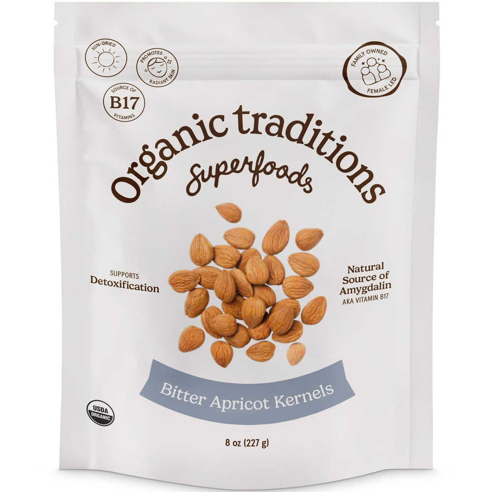Organic Traditions apricot kernels package front, premium vegan snack option.