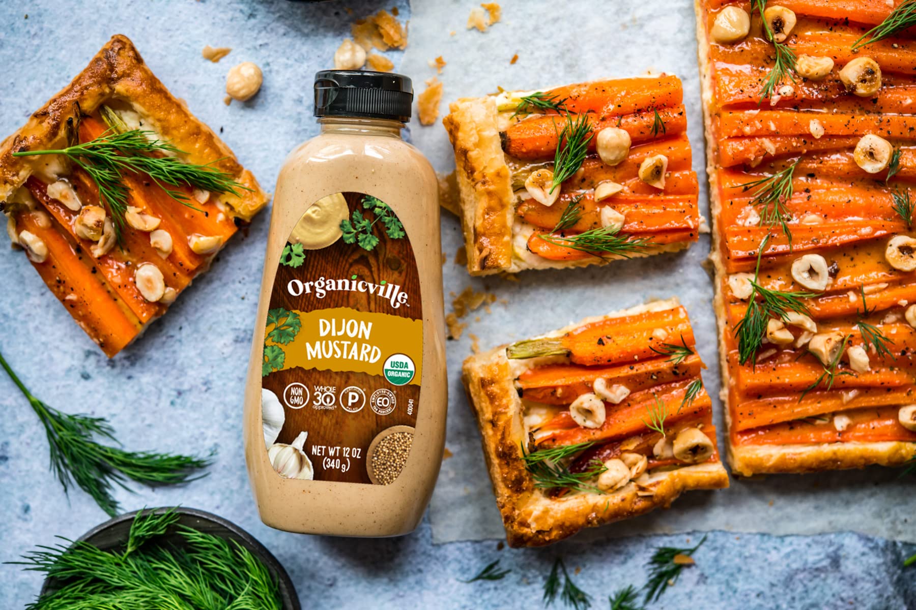 Organicville Dijon mustard on antipasto platter shows Mediterranean pairing.