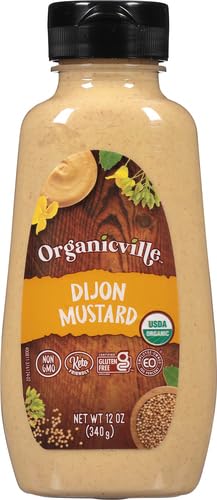 Organicville Dijon mustard spoon-dip setup highlights versatile tangy flavor.