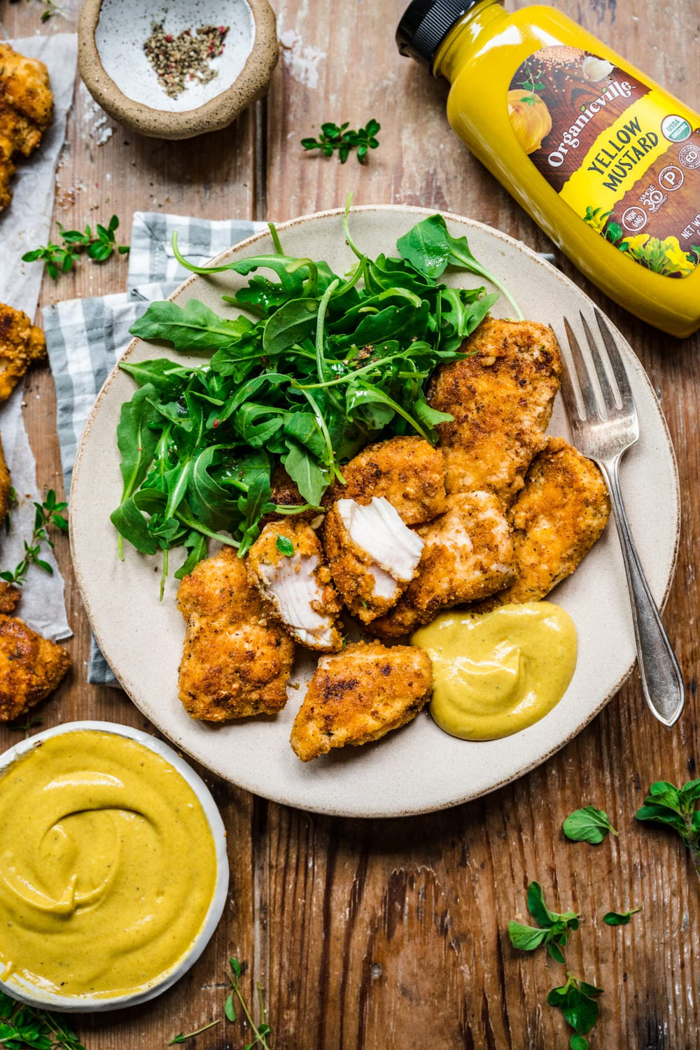 Organicville Yellow Mustard being poured demonstrates easy-squeeze convenience for quick meals.