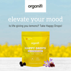 Organifi Happy Drops lemon flavor gummies on plate.