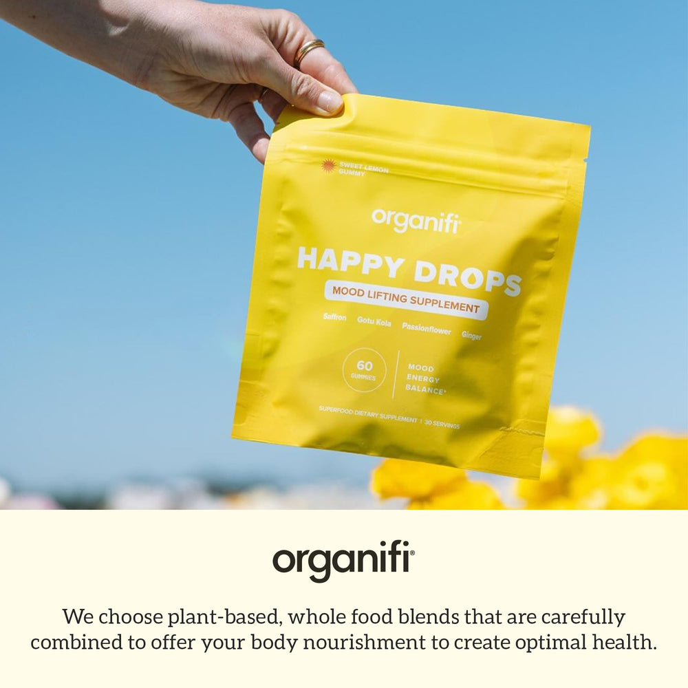 Organifi Happy Drops on kitchen counter suggesting daily routine.