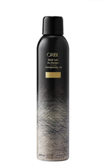 Oribe Gold Lust Dry Shampoo bottle pour for quick refresh.
