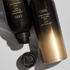 Oribe Impermeable spray curls definition demo emphasizes defined, frizz-free curls.