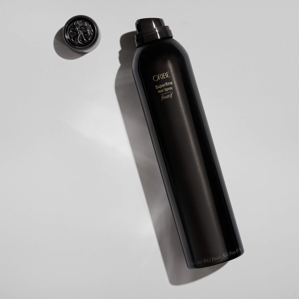 Oribe Superfine packaging on display communicates premium, clean formula.