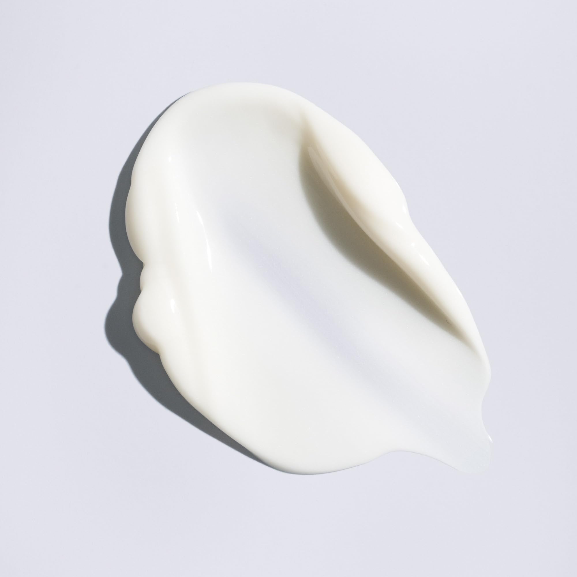 Oribe Supershine leave-in close-up conveying conditioning for softness