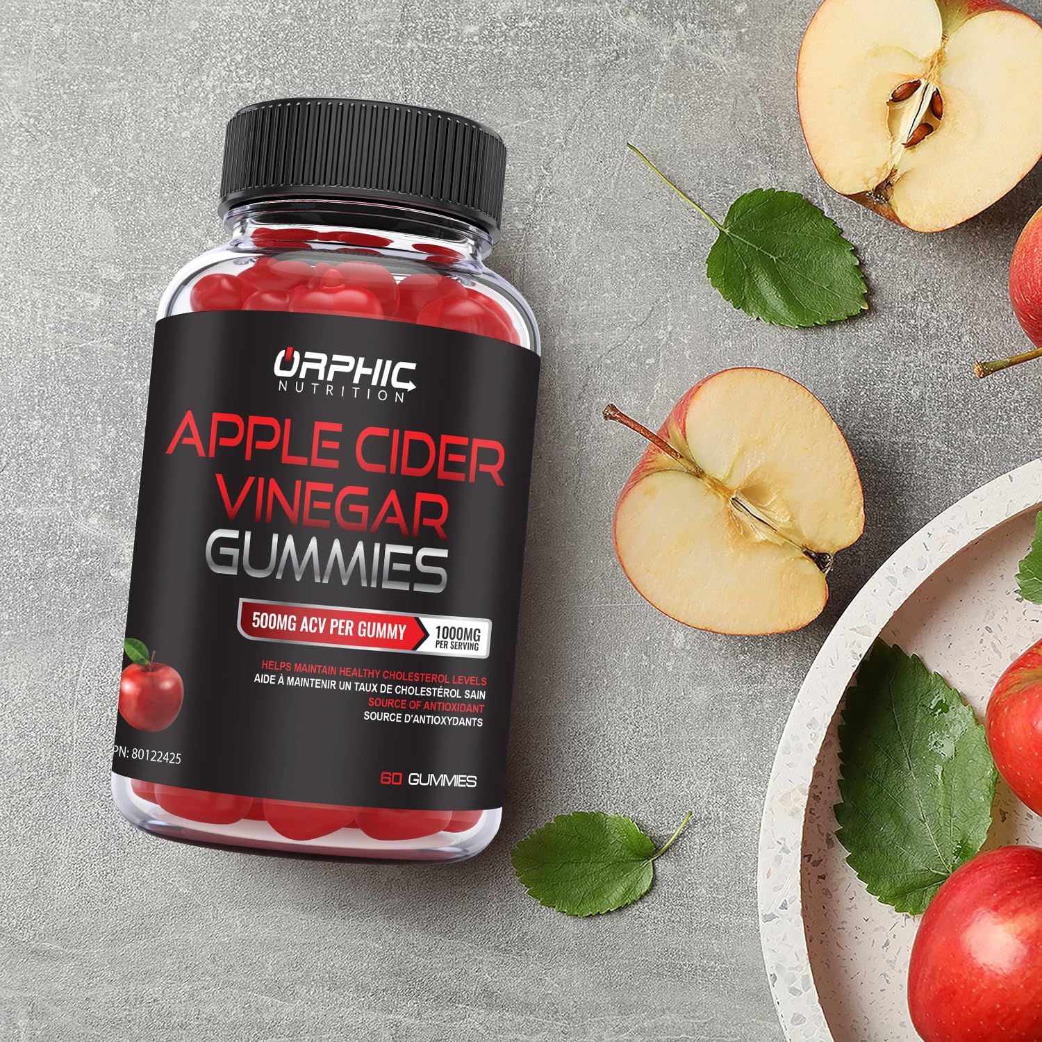 ORPHIC NUTRITION gummies beside apple and pomegranate emphasizing natural flavors