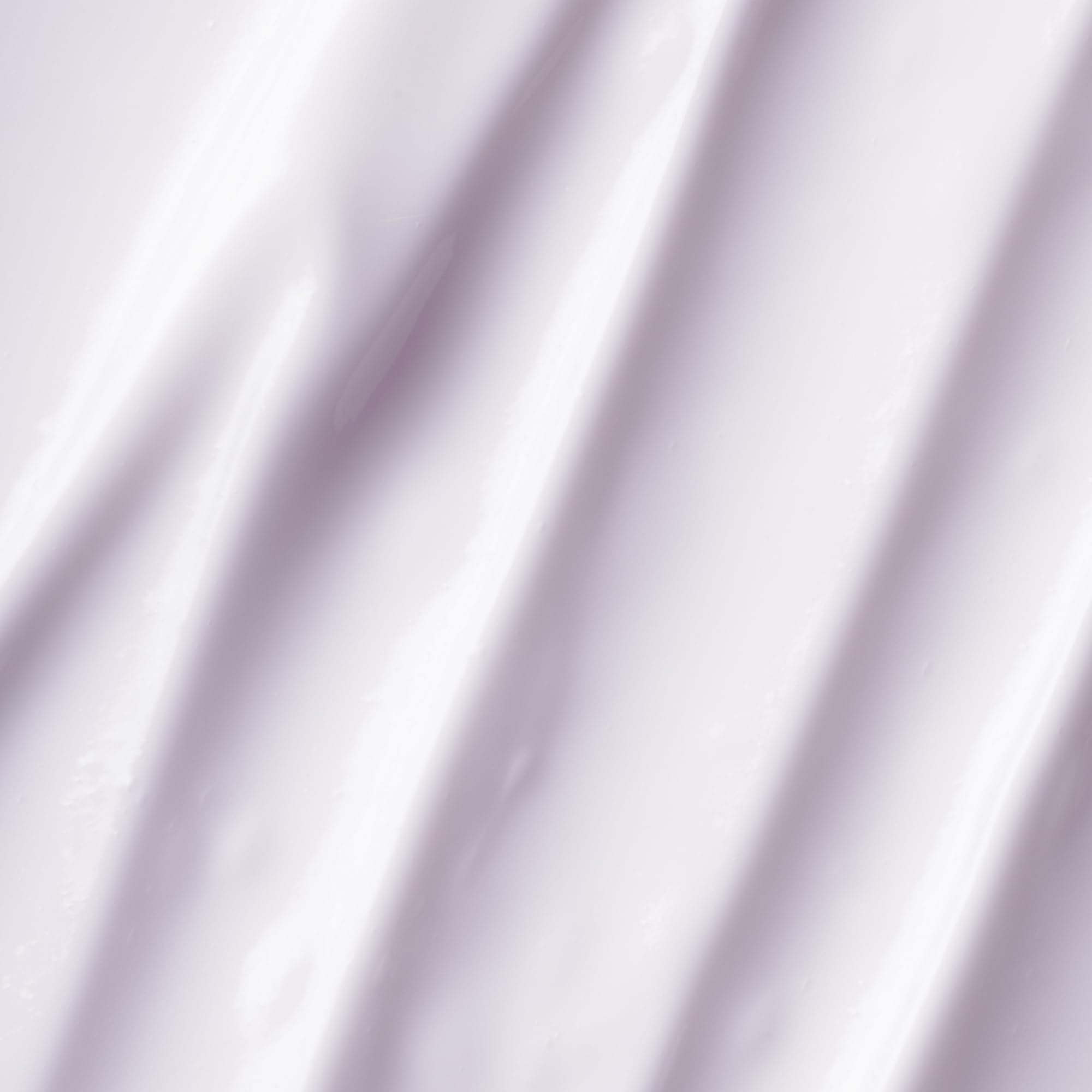 OSEA Dream Night Cream jar close-up reveals smooth, creamy texture.