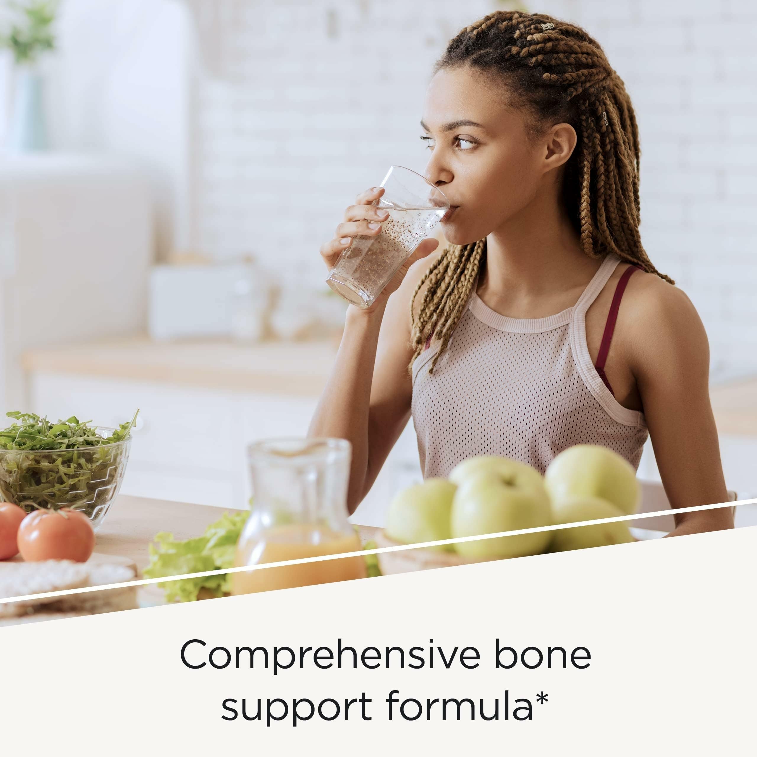 OsteoPrime Ultra daily dose tablets with water, illustrating easy intake.