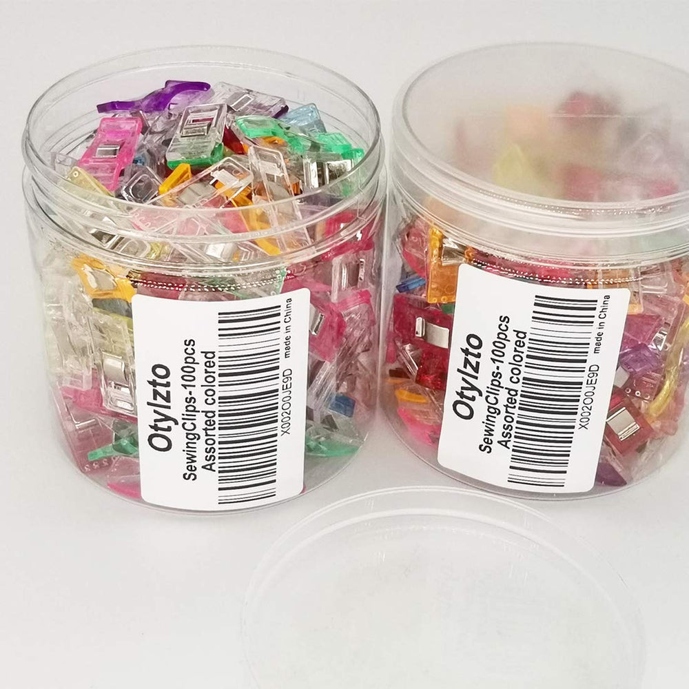 Otylzto sewing clips with color assortment in clear jar for easy organization.