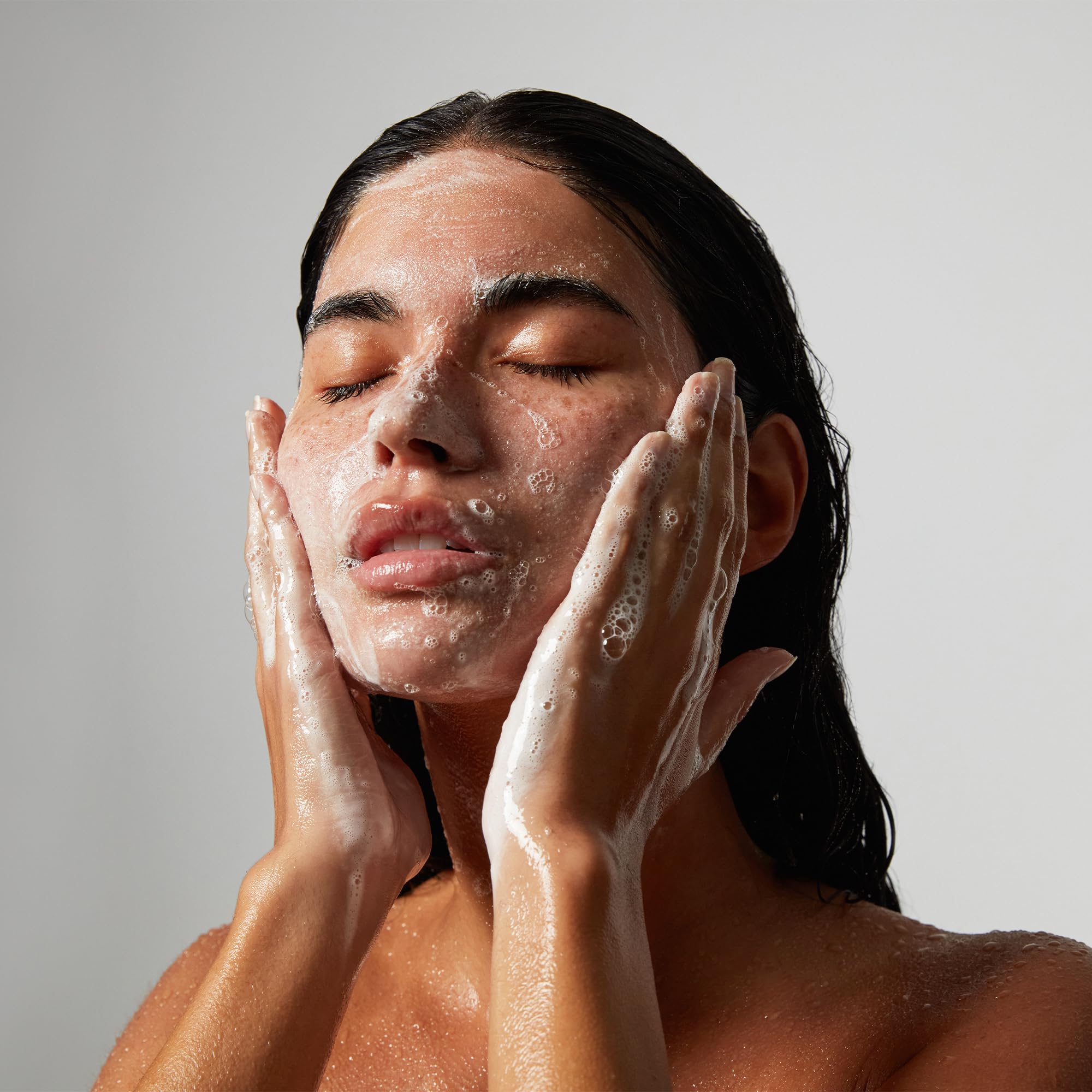 OUAI Detox Facial Cleanser damp-skin use scene highlights routine morning and night.