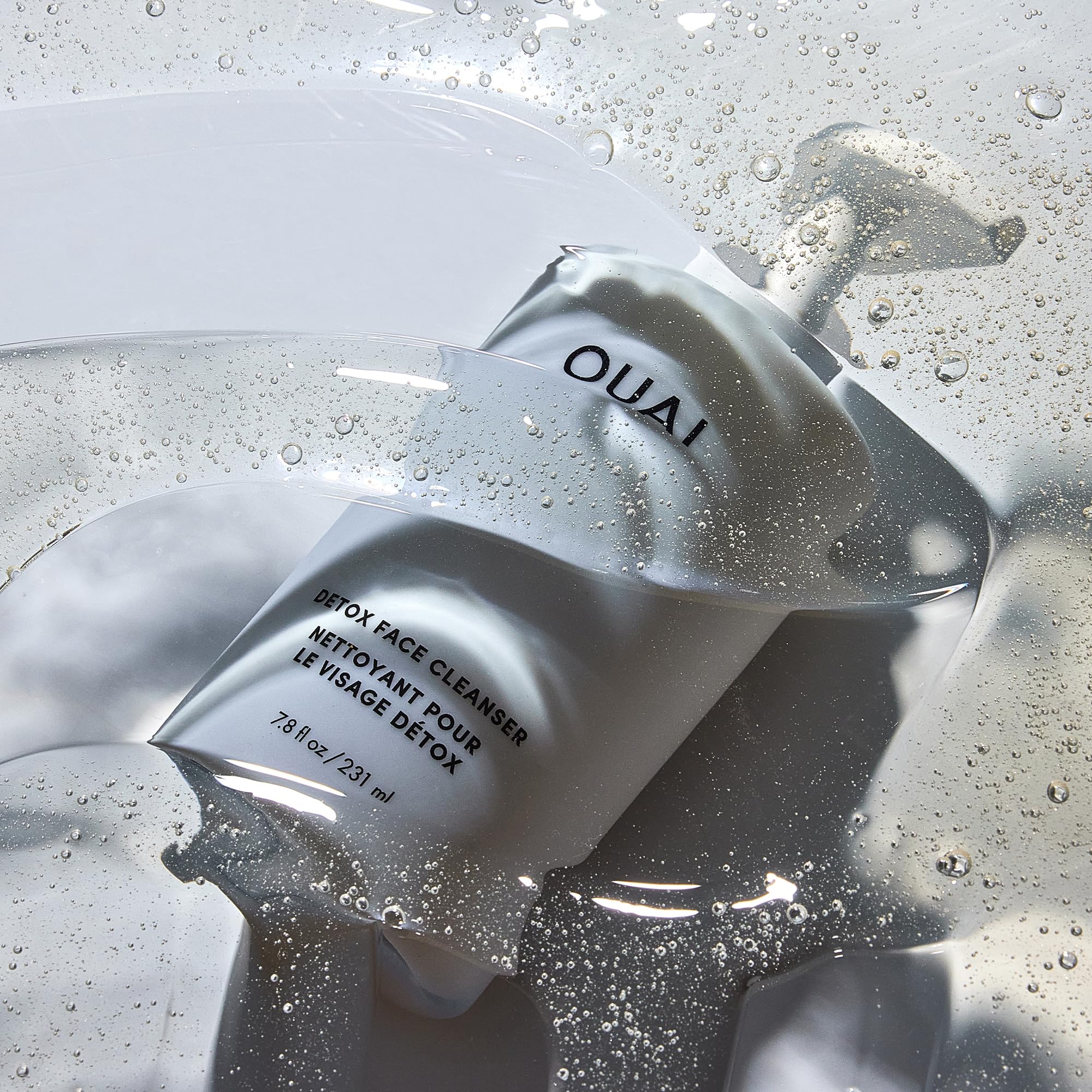OUAI Detox Facial Cleanser packaging box on shelf suggests everyday skincare ritual.