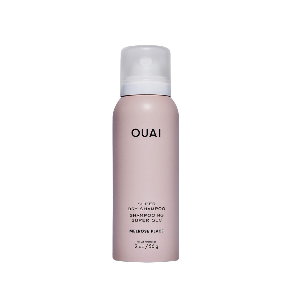 OUAI super travel dry shampoo can close-up, ideal for on-the-go refresh.