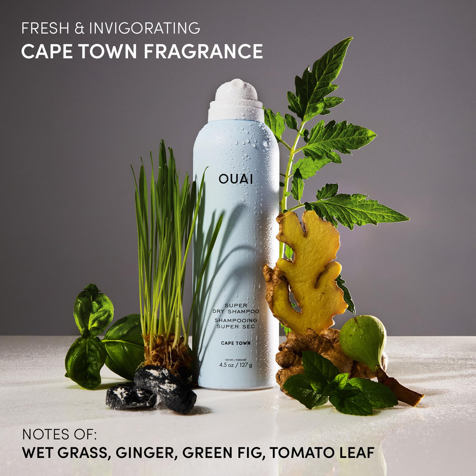 OUAI travel-size dry shampoo portable for on-the-go freshness.