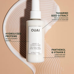 OUAI Wave Spray texture close-up showing light mist.