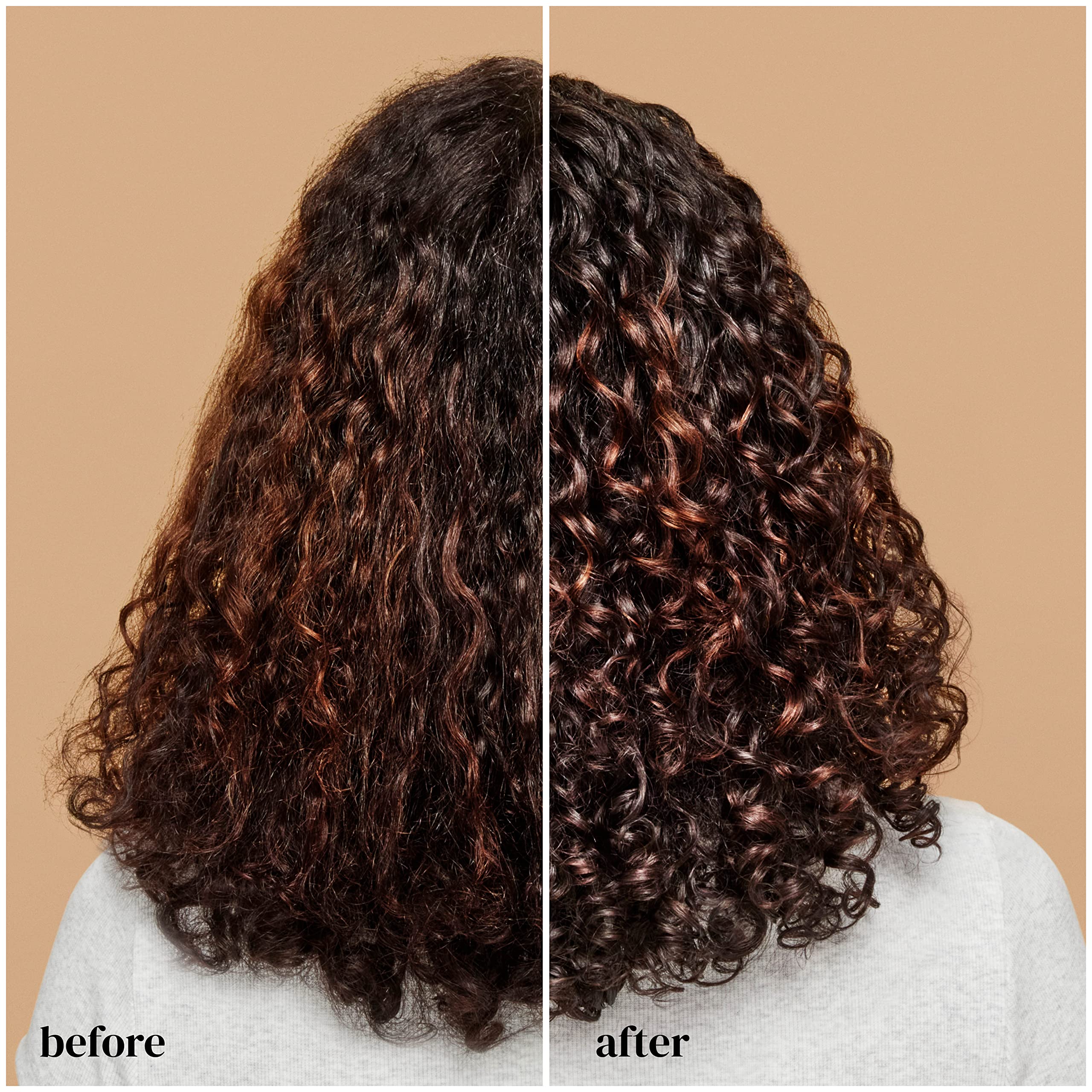 Ouidad Advanced Climate Control curls close-up with defined, frizz-free texture.