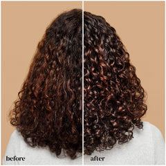 Ouidad Advanced Climate Control curls close-up with defined, frizz-free texture.