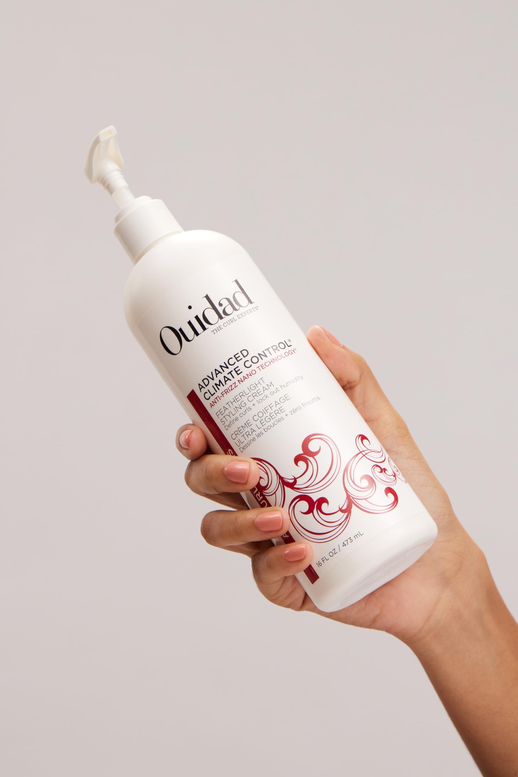 Ouidad Advanced Climate Control shiny, hydrated curls after styling.