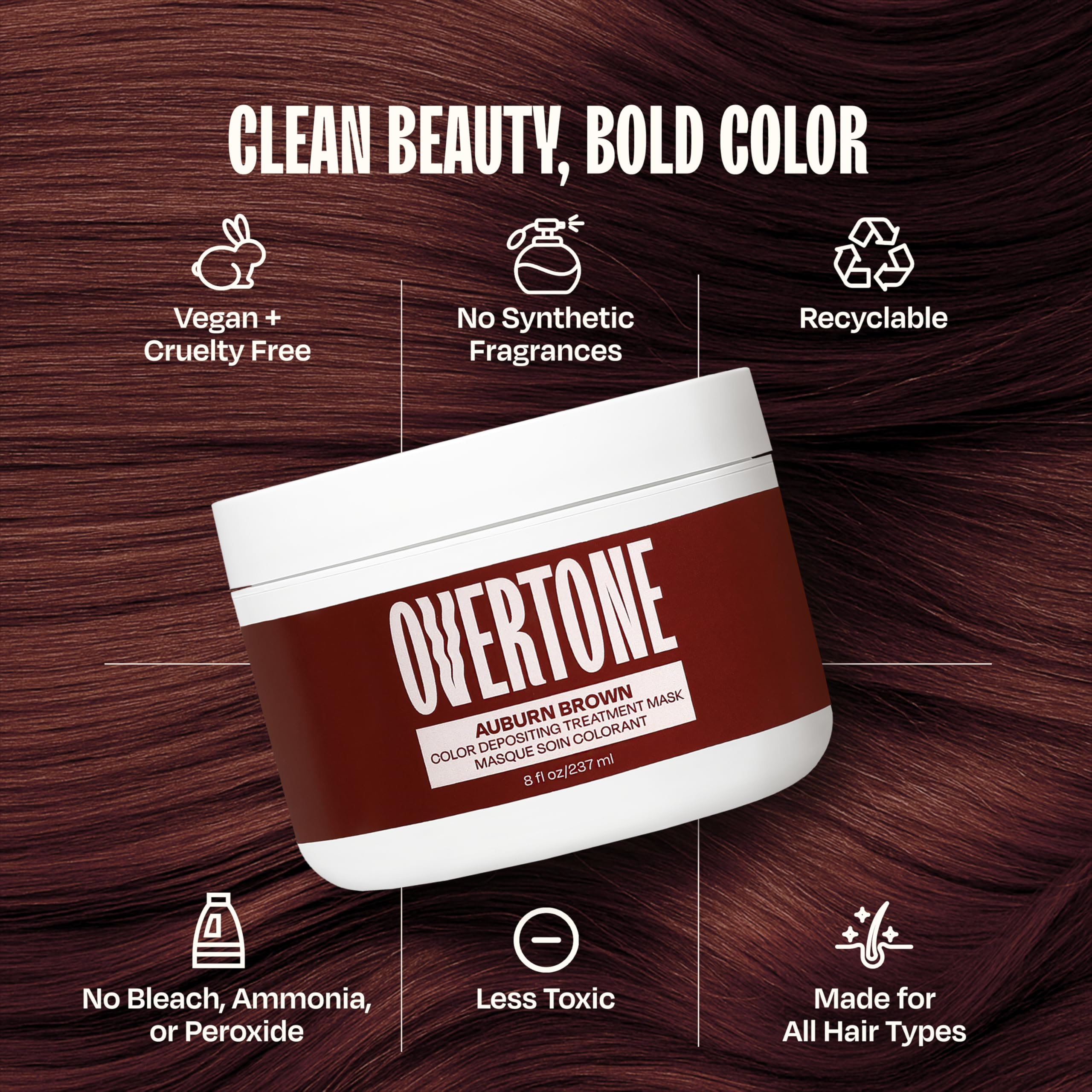 Overtone Auburn Brown applying mask to dry hair for even tint.