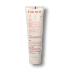 Overtone Ginger Glow bottle on shelf suggests easy in-shower color refresh for hair.
