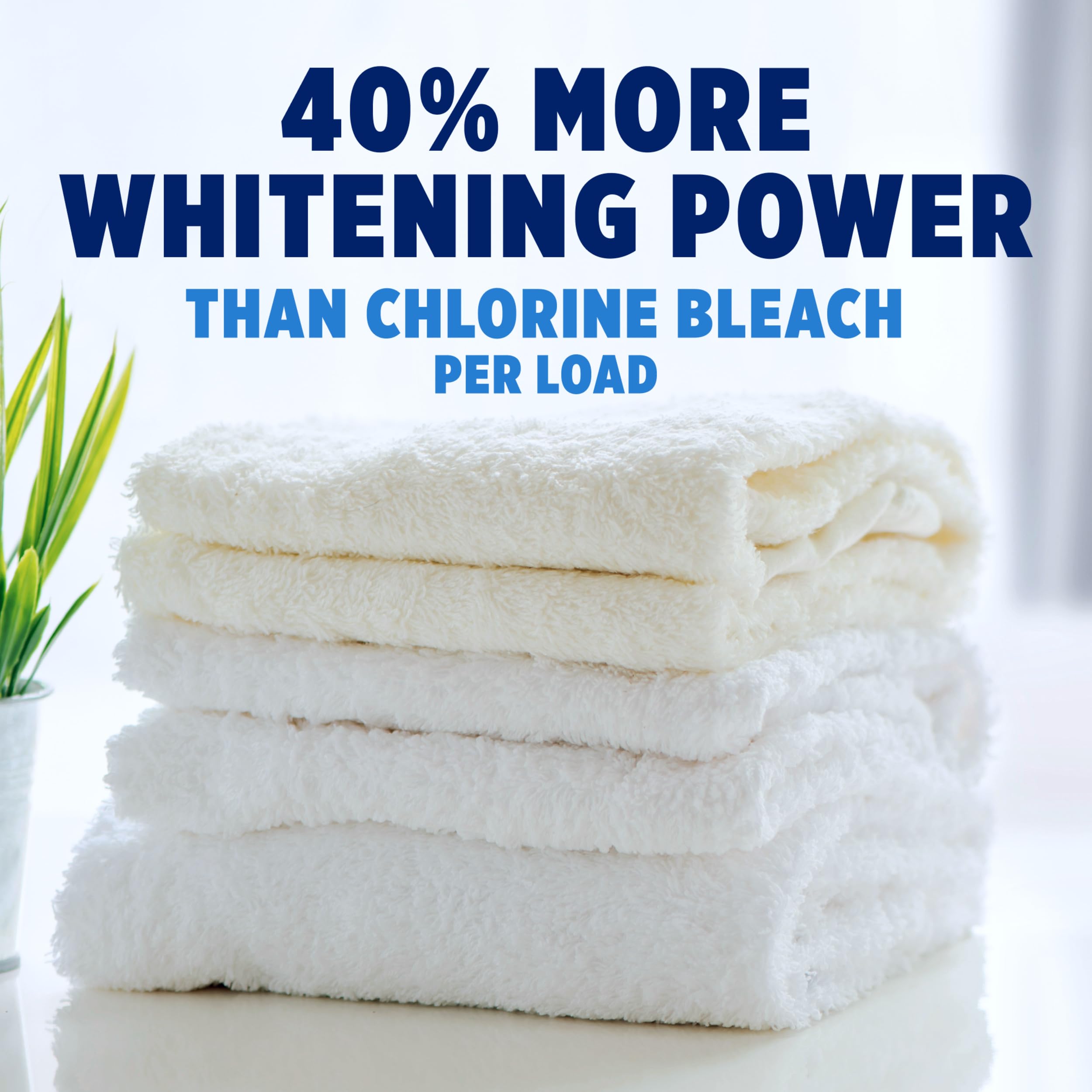Pouring Oxiclean White Revive into the wash for brighter whites